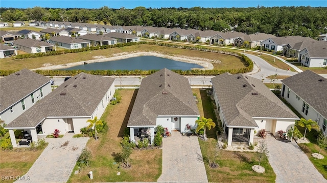 aerial view featuring a water view and a residential view
