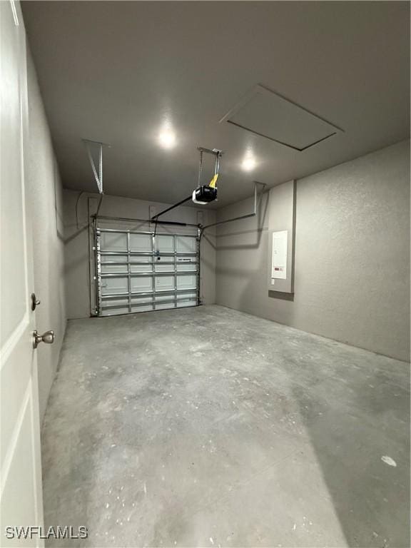 garage featuring a garage door opener