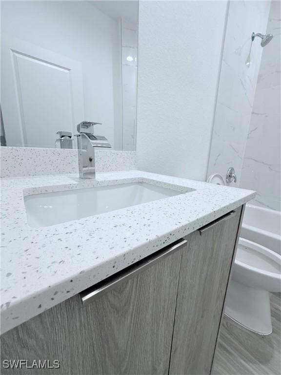 full bath featuring shower / tub combination and vanity