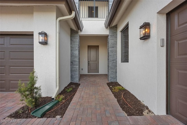 5243 Karlia Dr, Ave Maria, FL 34142 - view of exterior entry featuring stucco siding