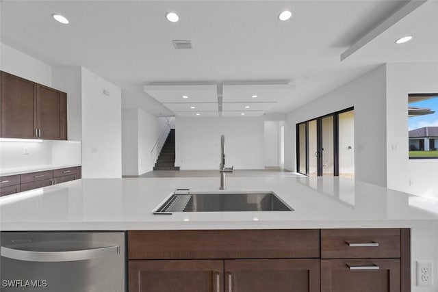 5243 Karlia Dr, Ave Maria, FL 34142 - kitchen featuring open floor plan, recessed lighting, light countertops, a sink, and dishwasher
