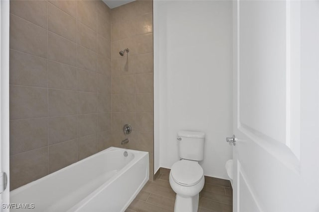 5243 Karlia Dr, Ave Maria, FL 34142 - bathroom featuring toilet and shower / tub combination