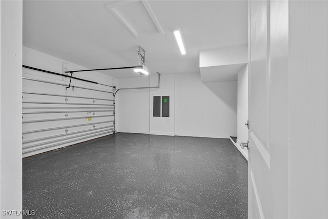 5243 Karlia Dr, Ave Maria, FL 34142 - garage featuring a garage door opener and electric panel