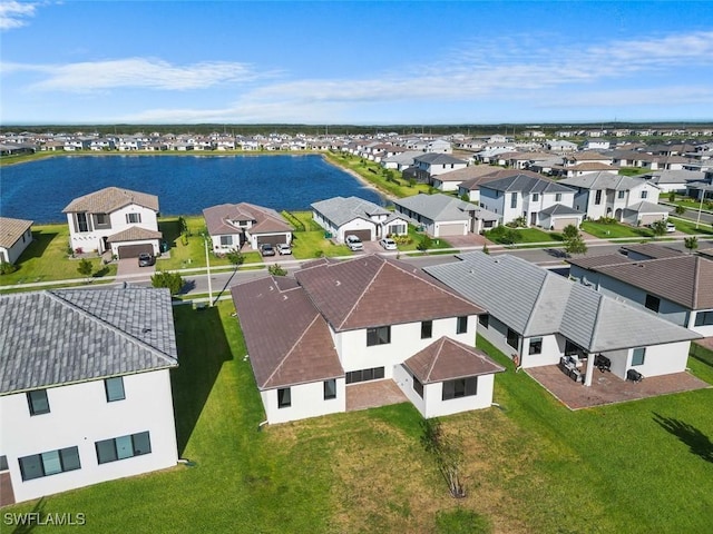 5243 Karlia Dr, Ave Maria, FL 34142 - birds eye view of property featuring a water view and a residential view