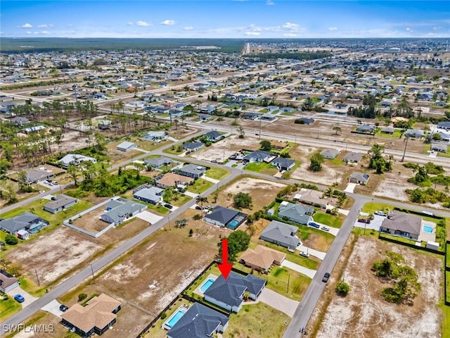 aerial overview of property's location with nearby suburban area