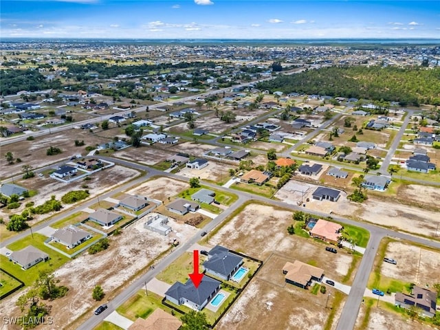 view of property location featuring nearby suburban area