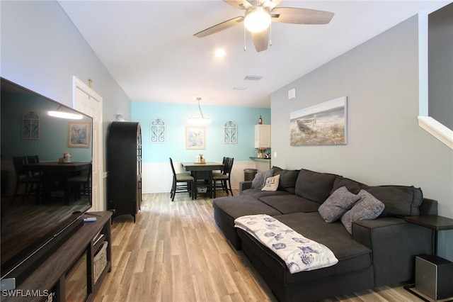 9792 Glen Heron Dr, Bonita Springs, FL 34135 - living room featuring a ceiling fan, light wood finished floors, and visible vents