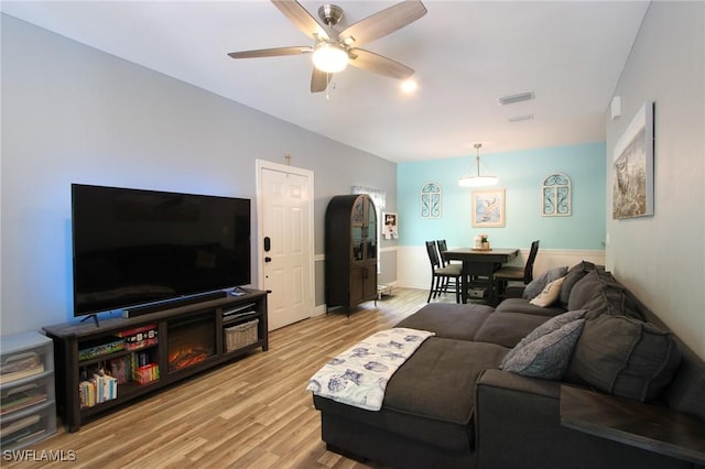 9792 Glen Heron Dr, Bonita Springs, FL 34135 - living room with a ceiling fan, light wood-style flooring, and visible vents