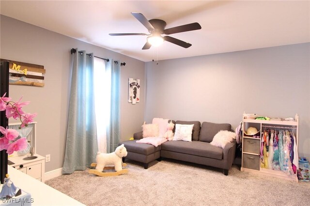 9792 Glen Heron Dr, Bonita Springs, FL 34135 - living area with carpet floors, a ceiling fan, and baseboards