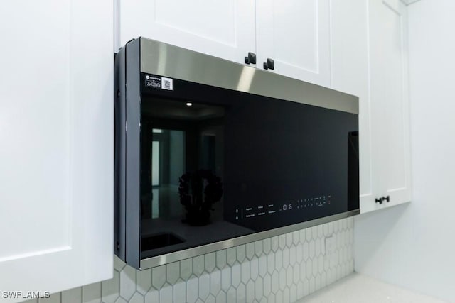 kitchen view of white cabinets