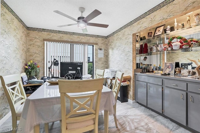 4732 Blackberry Dr, Fort Myers, FL 33905 - dining room featuring wallpapered walls, ceiling fan, crown molding, a textured ceiling, and light marble finish floors