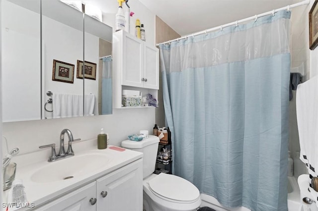 4732 Blackberry Dr, Fort Myers, FL 33905 - bathroom featuring toilet, vanity, and shower / tub combo with curtain