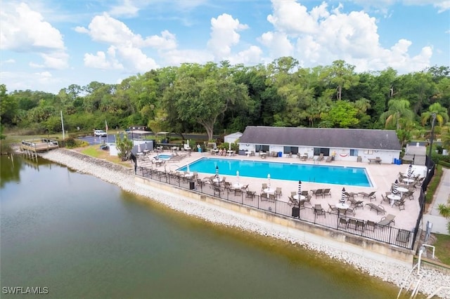 4732 Blackberry Dr, Fort Myers, FL 33905 - community pool with a patio, a water view, and a view of trees
