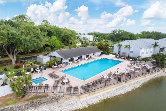 4732 Blackberry Dr, Fort Myers, FL 33905 - community pool featuring fence, a patio, a water view, and view of wooded area