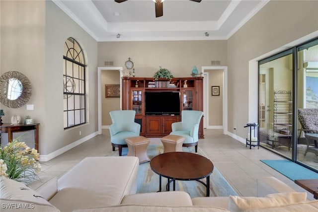 28404 Via Odanti Dr, Bonita Springs, FL 34135 - living area with ceiling fan, visible vents, light tile patterned floors, baseboards, and a tray ceiling