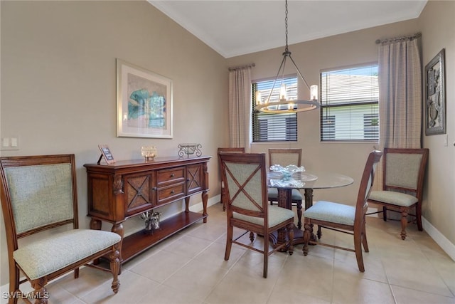 28404 Via Odanti Dr, Bonita Springs, FL 34135 - dining area with baseboards, a notable chandelier, and light tile patterned floors