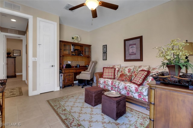 28404 Via Odanti Dr, Bonita Springs, FL 34135 - living area featuring light tile patterned floors, a ceiling fan, and visible vents