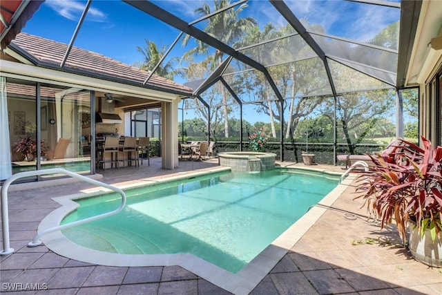 28404 Via Odanti Dr, Bonita Springs, FL 34135 - view of swimming pool featuring a patio, a pool with connected hot tub, a lanai, and outdoor dry bar