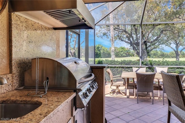 28404 Via Odanti Dr, Bonita Springs, FL 34135 - view of patio / terrace featuring a sink, exterior kitchen, outdoor dining space, and a grill
