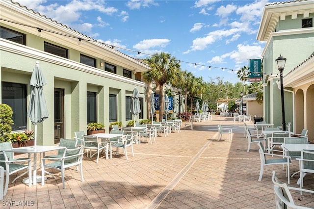 10520 Amiata Way Unit 303, Fort Myers, FL 33913 - view of patio featuring outdoor dining space