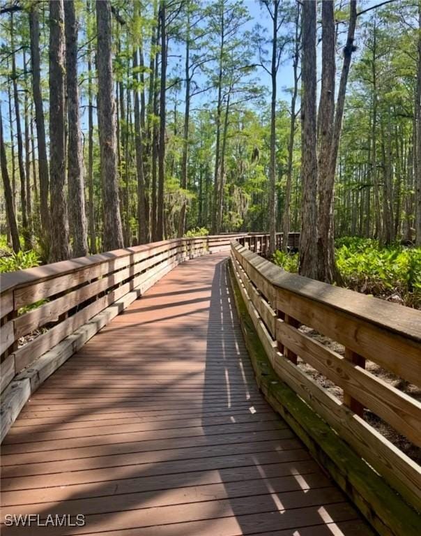 10520 Amiata Way Unit 303, Fort Myers, FL 33913 - view of home's community featuring a forest view