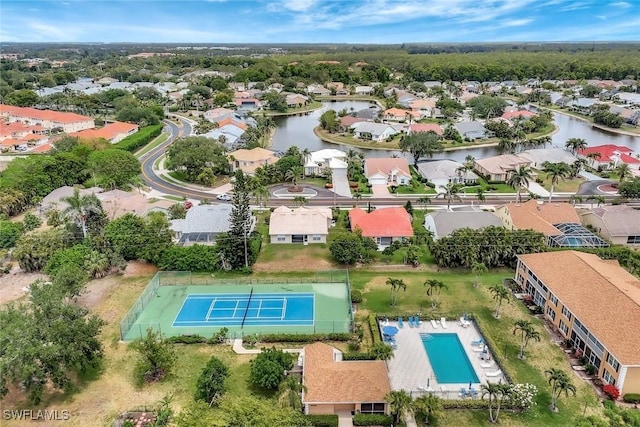 aerial view with a water view and a residential view