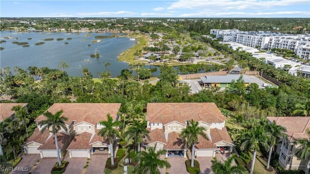 aerial view featuring a water view and a residential view