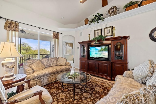 living room with ceiling fan, visible vents, and high vaulted ceiling