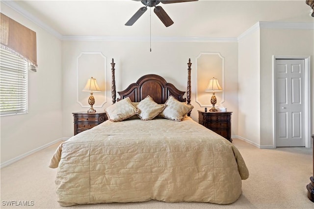 bedroom with crown molding, baseboards, and light carpet