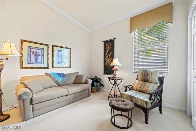 living room featuring baseboards, ornamental molding, and light carpet