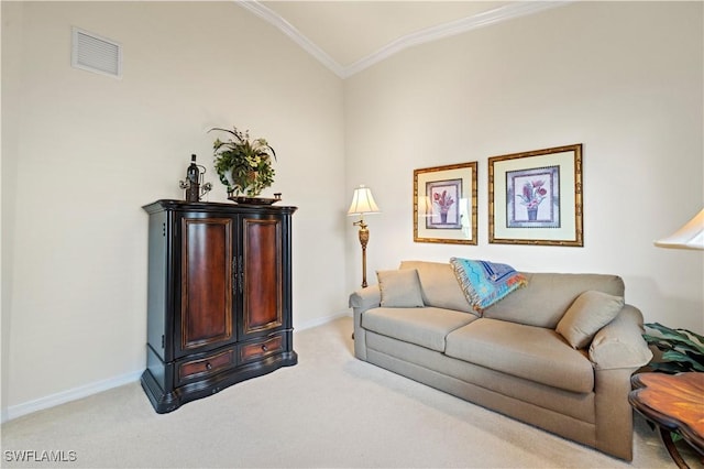 sitting room featuring carpet flooring, visible vents, baseboards, vaulted ceiling, and ornamental molding