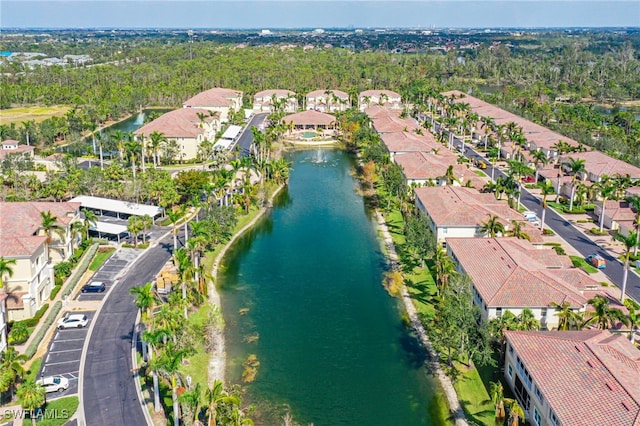 aerial view with a residential view and a water view