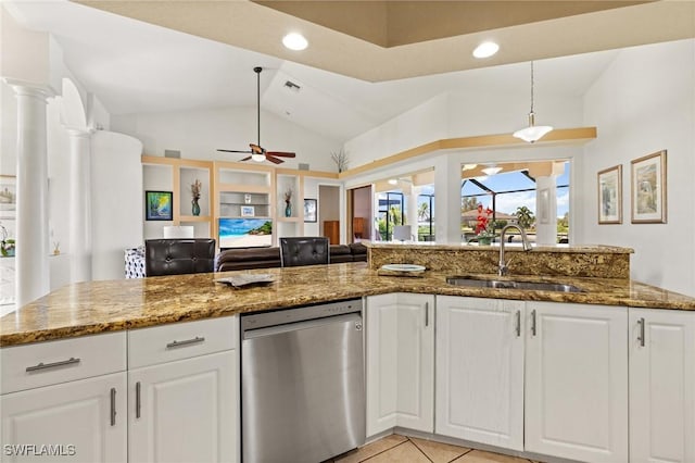 2536 SW 28th Pl, Cape Coral, FL 33914 - kitchen with white cabinets, ceiling fan, a sink, dishwasher, and lofted ceiling