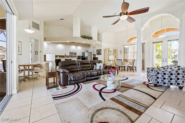 2536 SW 28th Pl, Cape Coral, FL 33914 - living area featuring visible vents, high vaulted ceiling, ornate columns, a ceiling fan, and light tile patterned floors