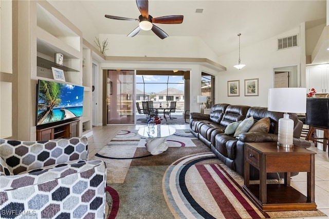 2536 SW 28th Pl, Cape Coral, FL 33914 - living room featuring built in shelves, a ceiling fan, light tile patterned floors, vaulted ceiling, and visible vents