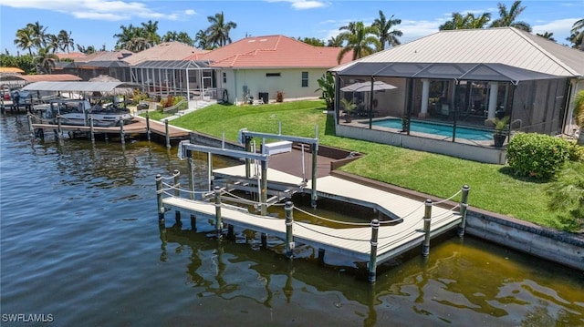 2536 SW 28th Pl, Cape Coral, FL 33914 - view of dock with a lanai, boat lift, a water view, and an outdoor pool