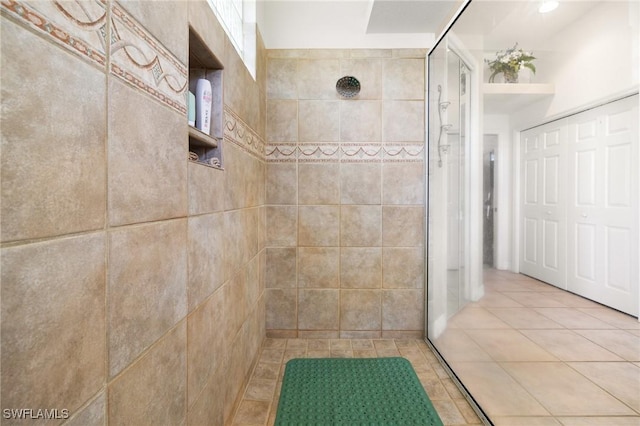 2536 SW 28th Pl, Cape Coral, FL 33914 - bathroom featuring tile patterned flooring and a tile shower