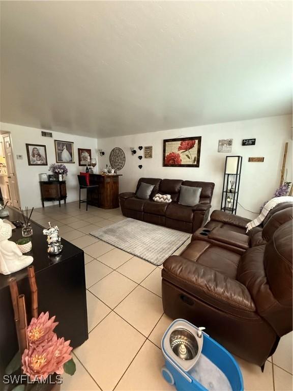 living room featuring light tile patterned floors