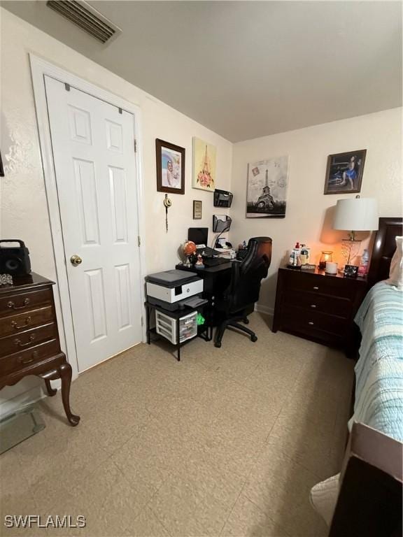 bedroom with visible vents