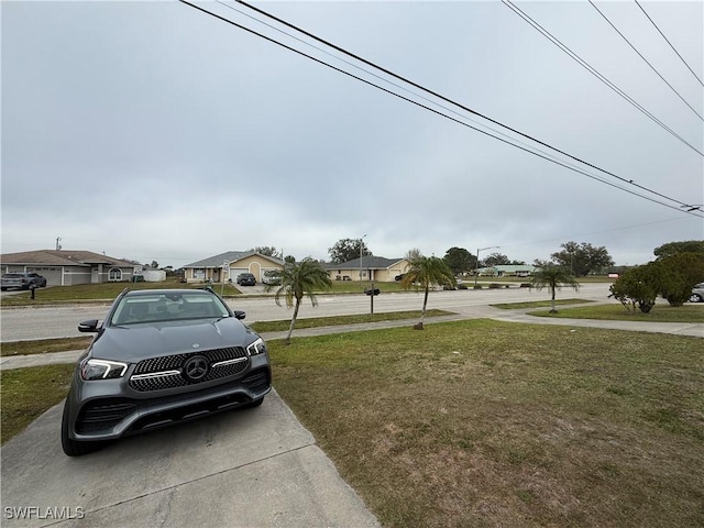 view of street with a residential view and sidewalks