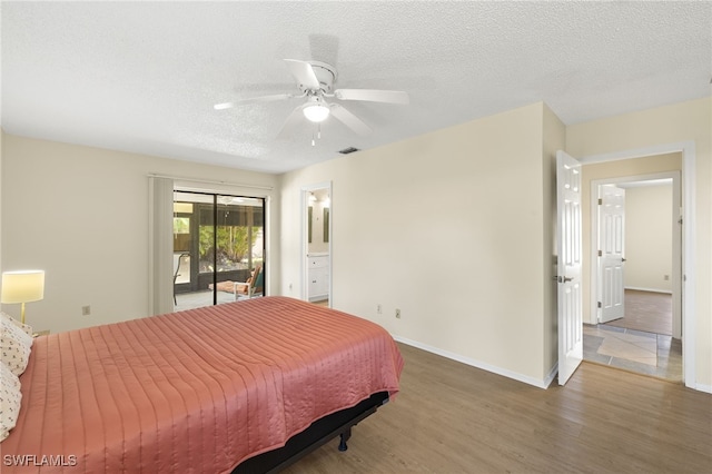7136 Blanquilla Ct, Fort Myers, FL 33908 - bedroom with wood finished floors, access to exterior, a textured ceiling, baseboards, and ceiling fan