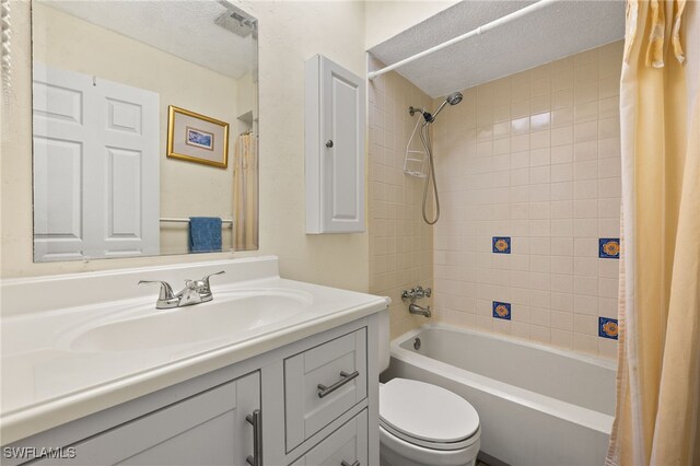 7136 Blanquilla Ct, Fort Myers, FL 33908 - bathroom featuring shower / bath combination with curtain, toilet, vanity, and a textured ceiling