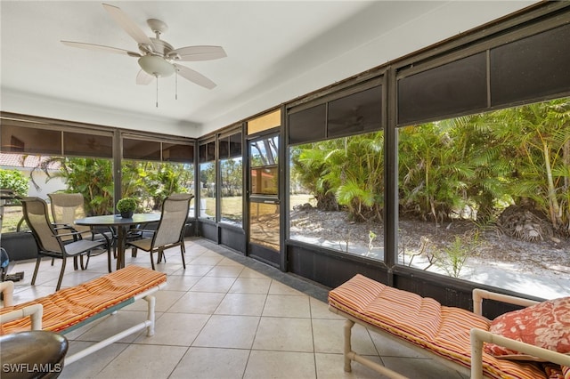7136 Blanquilla Ct, Fort Myers, FL 33908 - sunroom with ceiling fan and outdoor dining space
