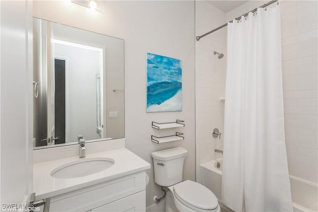 full bath featuring shower / bathtub combination with curtain, vanity, and toilet