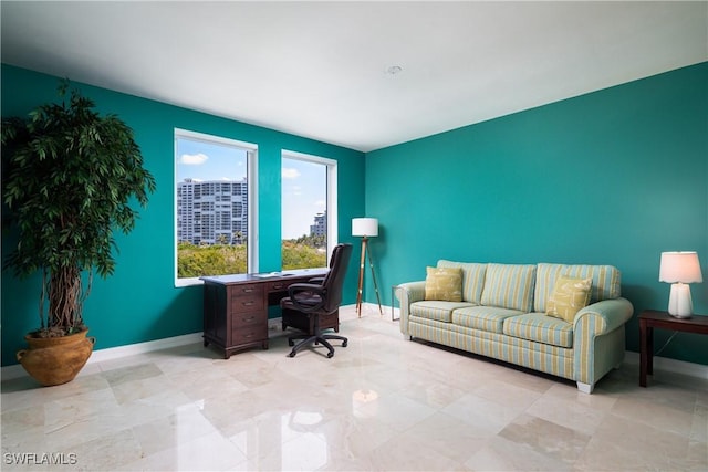 office space featuring baseboards