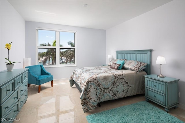 bedroom with baseboards