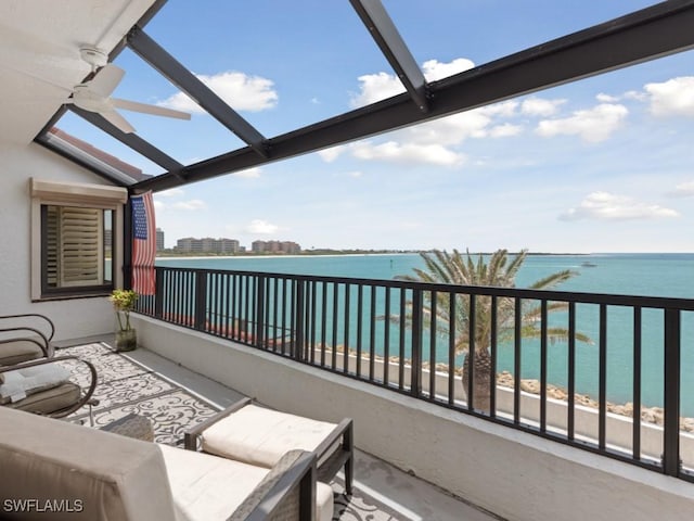 balcony featuring a water view