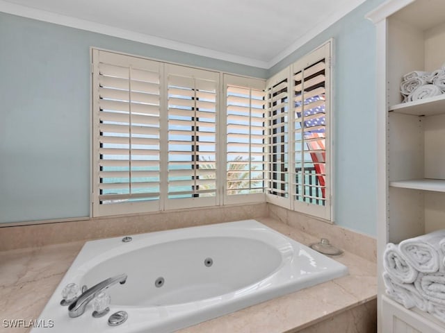 full bath featuring a tub with jets, crown molding, and a healthy amount of sunlight