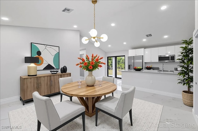 631 Summit Ave S, Lehigh Acres, FL 33974 - dining space featuring recessed lighting, light marble finish flooring, baseboards, a chandelier, and lofted ceiling