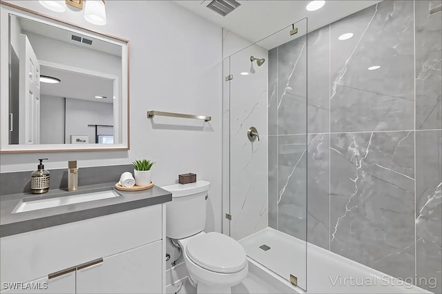 631 Summit Ave S, Lehigh Acres, FL 33974 - full bathroom featuring vanity, toilet, and a marble finish shower